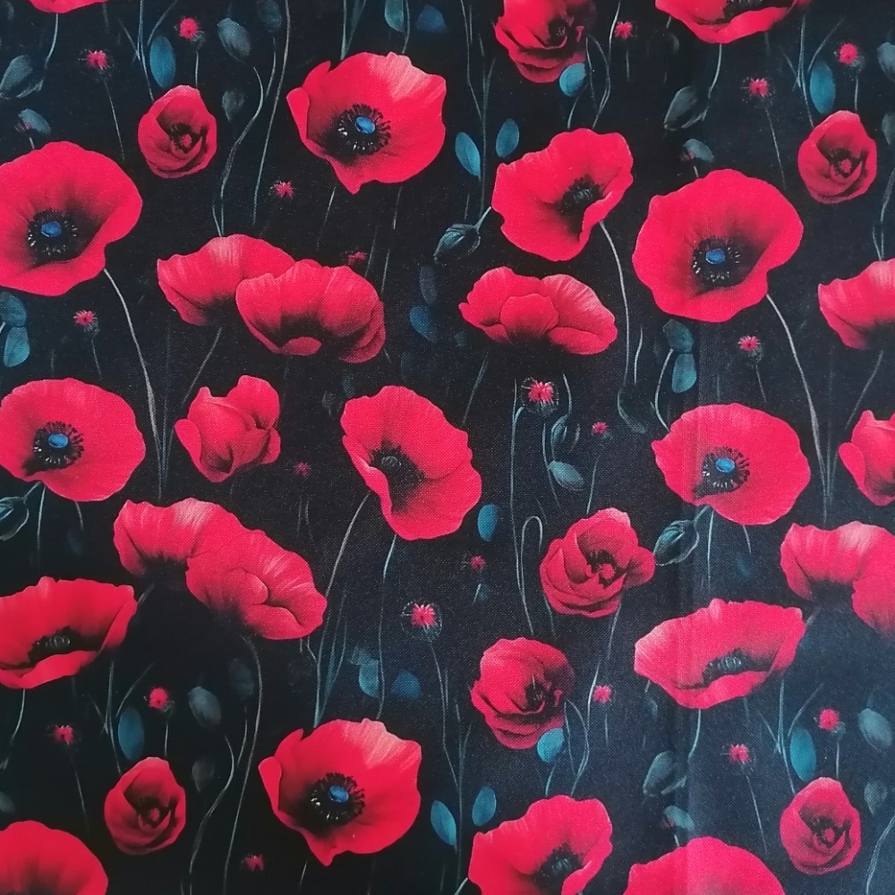 Módní doplněk s  motivem vlčího máku